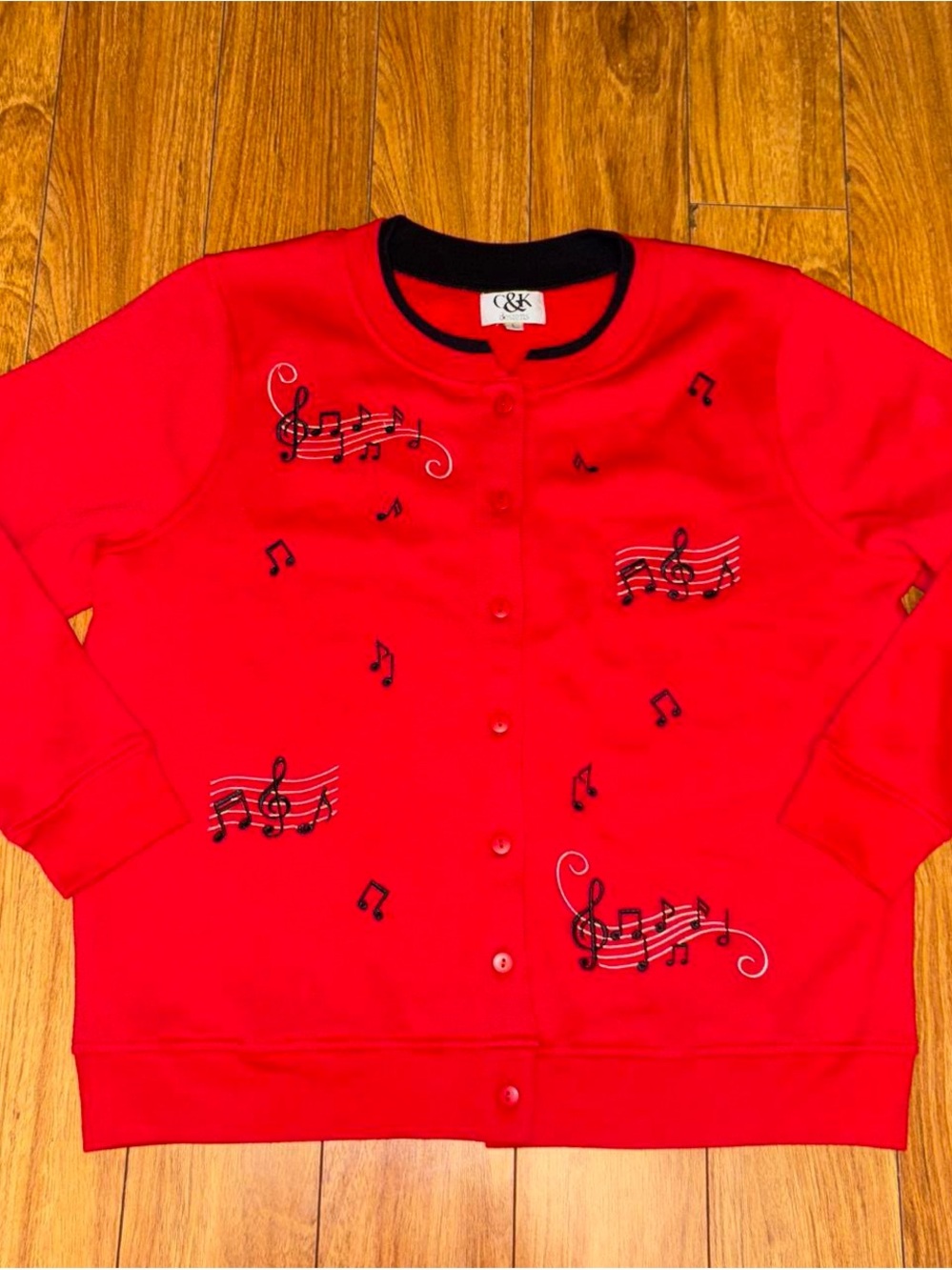 Red music note button up embroidered cardigan with black accents